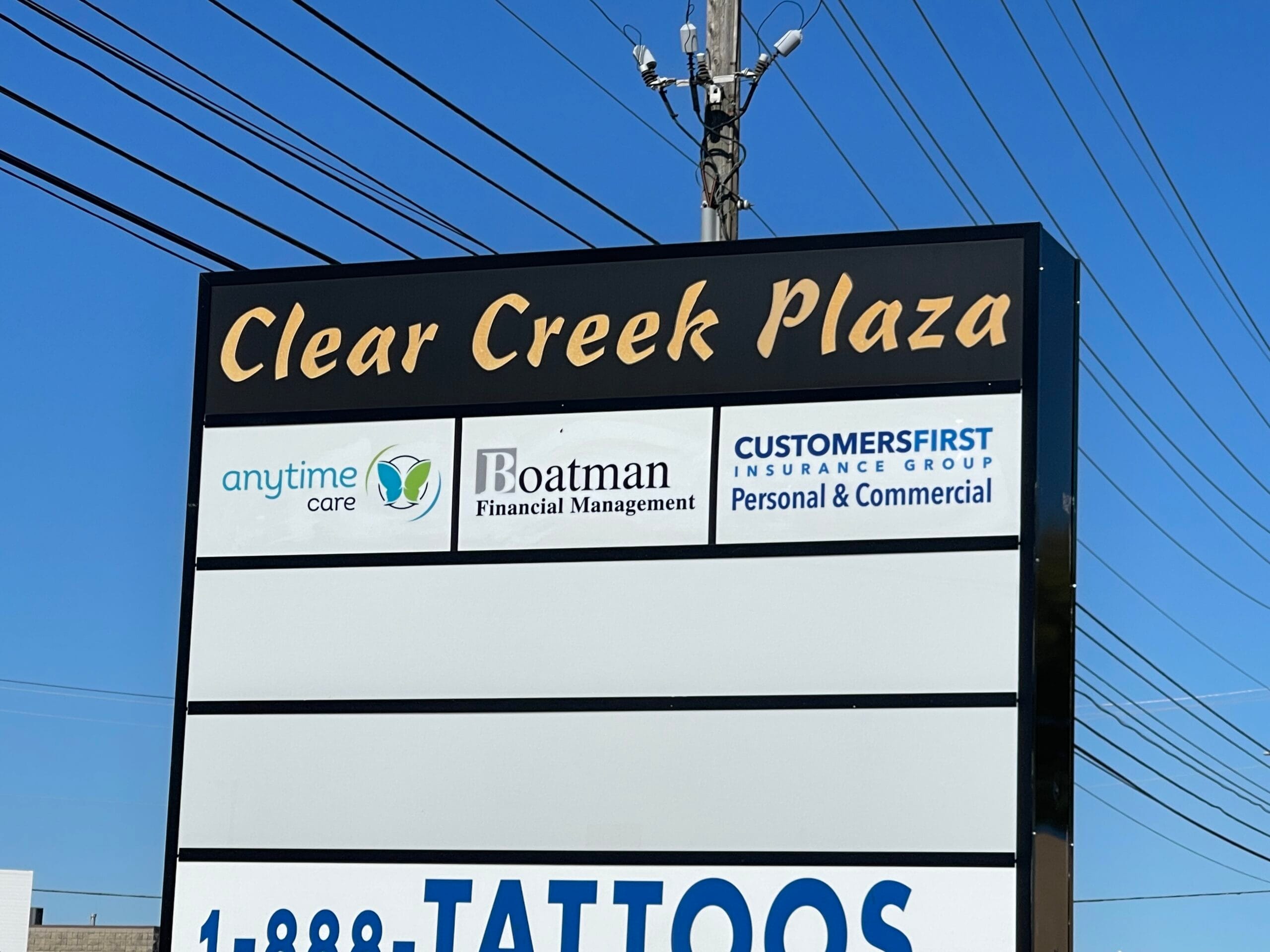 Clear Creek Plaza in Chesterfield Clear Creek Plaza street sign featuring Customers First Insurance Group
